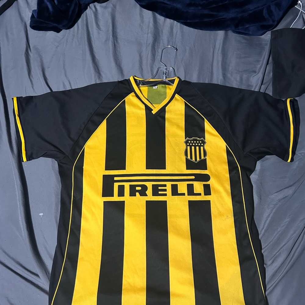 Black and Yellow Striped Soccer Jersey with Sponsor
